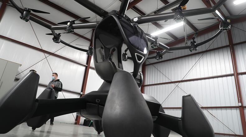 LIFT Aircraft unveiled their new electric vertical takeoff and landing (eVTOL) vehicle at Springfield-Beckley Municipal Airport earlier this month. The “flying car” is the first to arrive in Ohio, and is supported by a recent $226,000 grant from JobsOhio’s Ohio Site Inventory Program in infrastructure investments at Springfield airport. BILL LACKEY/STAFF