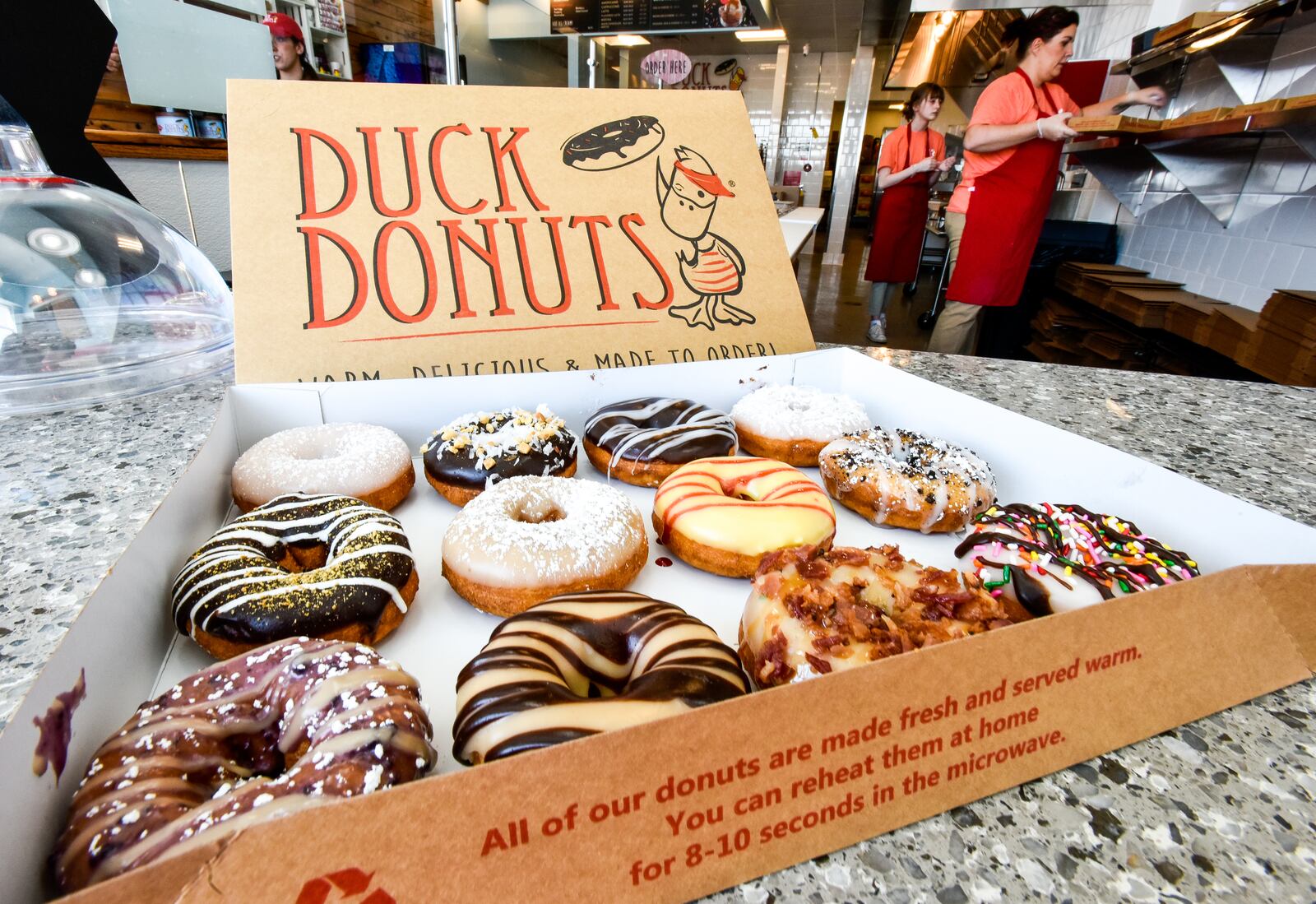 Duck Donuts opened their doors for a preview event Thursday, April 12. Duck Donuts opens April 13 in Deerfield Towne Center in Mason. The donut shop offers fresh made-to-order donuts with a variety of toppings. NICK GRAHAM/STAFF