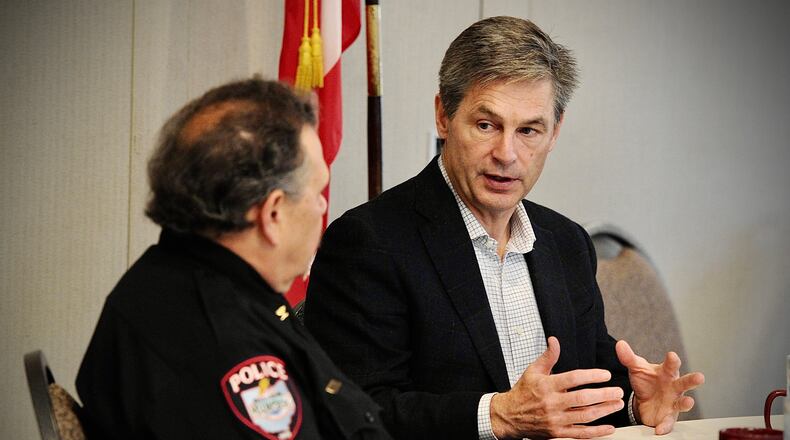 U.S. Senate candidate Matt Dolan, right, held a local law enforcement roundtable at The Golf Club at Yankee Trace, Friday March 25, 2022. Dolan is a Republican state senator from Chagrin Falls. MARSHALL GORBY\STAFF