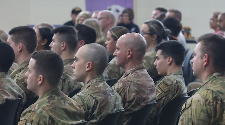 The Airmen with the 178th Wing of the Ohio Air National Guard and their families participated in a Call to Duty Ceremony Sunday at the Springfield National Guard Base. The airmen are deploying in support of the Air Force Central Command to provide tactical command and control capabilities. BILL LACKEY/STAFF
