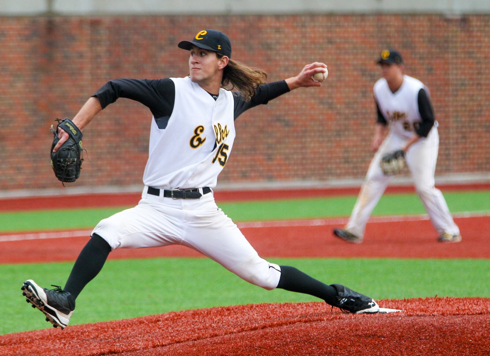 Centerville pitcher Joey Hecht (15) throws to the plate Thursday during a Division I regional semifinal against Lakota West at the University of Cincinnati’s Marge Schott Stadium. GREG LYNCH/STAFF