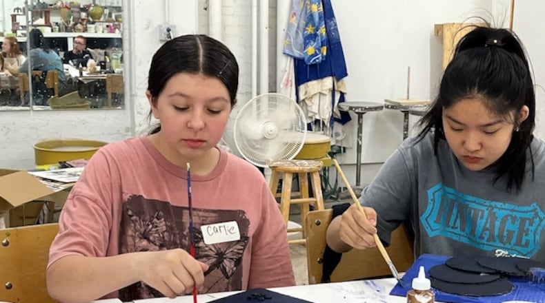 Campers enjoy making art at K12/TEJAS gallery.
Contributed .