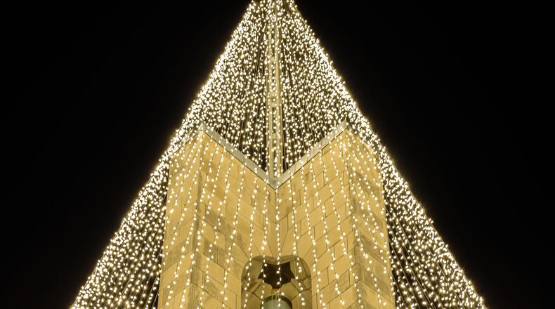 Deeds Carillon is now transformed into the Carillon Tree of Light during the holiday season. The breathtaking Tree of Light — an unmistakable symbol of Christmas in the Miami Valley — signals the return of Carillon Historical Park’s month-long holiday celebration: A Carillon Christmas. TOM GILLIAM / CONTRIBUTING PHOTOGRAPHER