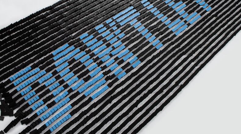 "Don't let up." Artists for Dayton's creative firm Real Art put a lot of hours into that simple message. Photo contributed by Real Art.