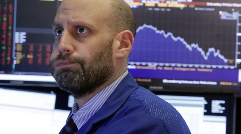 Specialist Meric Greenbaum works on the floor of the New York Stock Exchange. The stock market closed sharply lower, extending a weeklong slide, as the Dow Jones industrial average plunged more than 600 points. Some investors believe the market can recover, noting that both global economic growth and corporate earnings remain strong. One hallmark of this bull market has been investors’ willingness to buy the dips. This week’s drop could test their resolve. (AP Photo/Richard Drew)