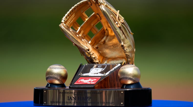 Chicago Cubs' Ian Happ's (8) Gold Glove Award is seen before a baseball game against the Cincinnati Reds, Saturday, May 31, 2025, in Chicago. (AP Photo/Erin Hooley)