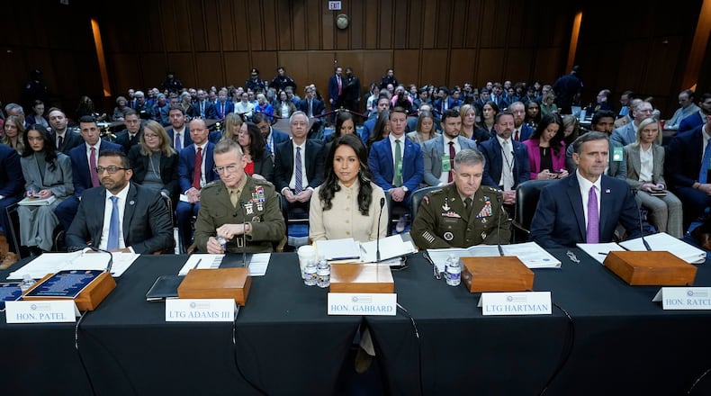 From left, FBI Director Kash Patel, Defense Intelligence Agency Director James Adams, Director of National Intelligence Tulsi Gabbard, Acting Commander of the U.S. Cyber Command William Hartman, and CIA Director John Ratcliffe are seated before the Senate Committee on Intelligence hearings to examine worldwide threats on Capitol Hill Wednesday, March 18, 2026, in Washington. (AP Photo/Jose Luis Magana)