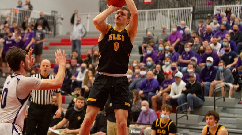 Centerville's Gabe Cupps shoots and scores during the second half of Wednesday night's Division I region semifinal at Princeton High School. Cupps scored 16 points to help the Elks defeat Cincinnati Elder 52-43. Jeff Gilbert/CONTRIBUTED