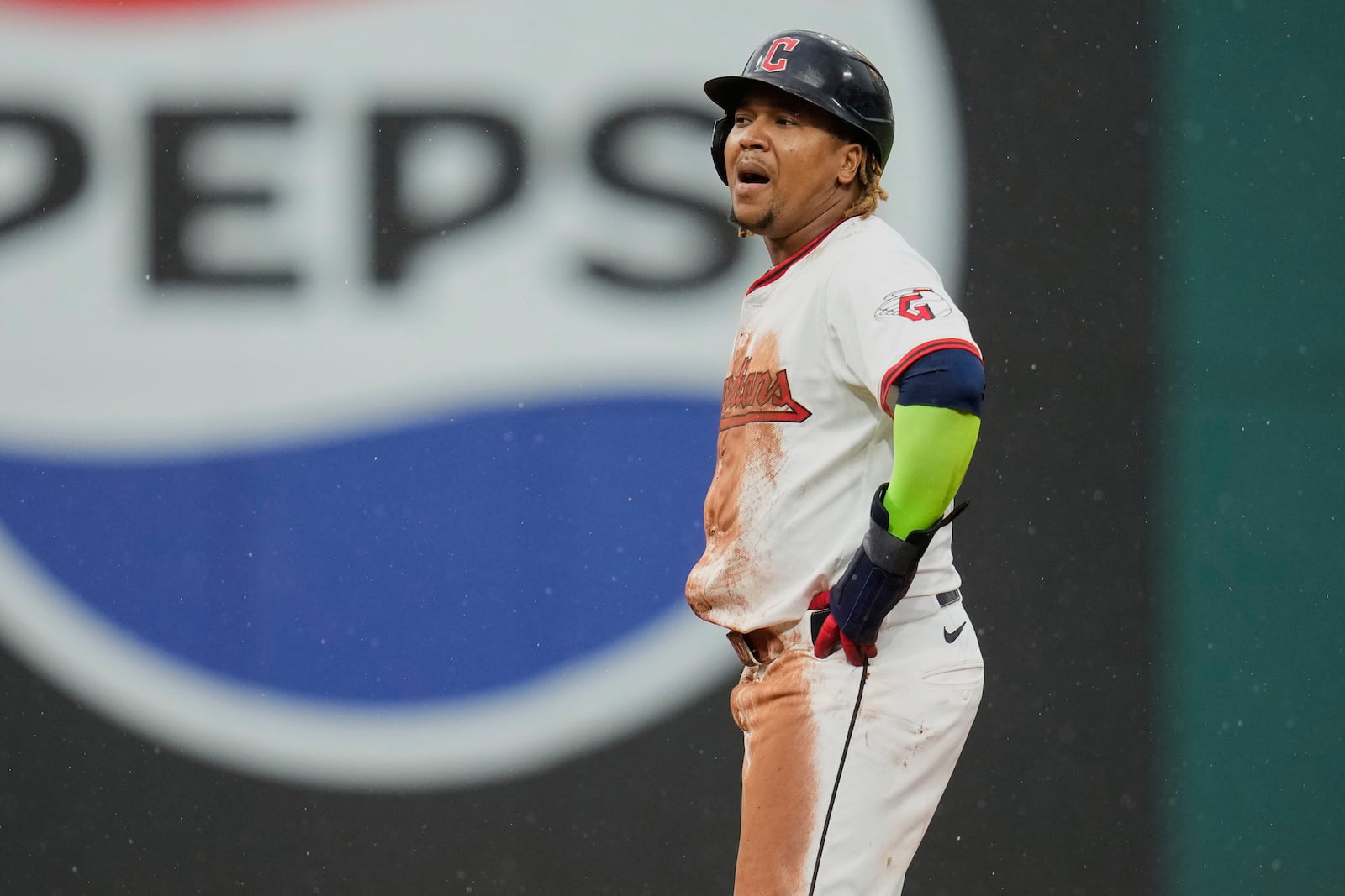 Cleveland Guardians' Jose Ramirez reacts after stealing second base, his 250th career steal, in the 10th inning of a baseball game against the Minnesota Twins in Cleveland, Thursday, May 1, 2025. (AP Photo/Sue Ogrocki)
