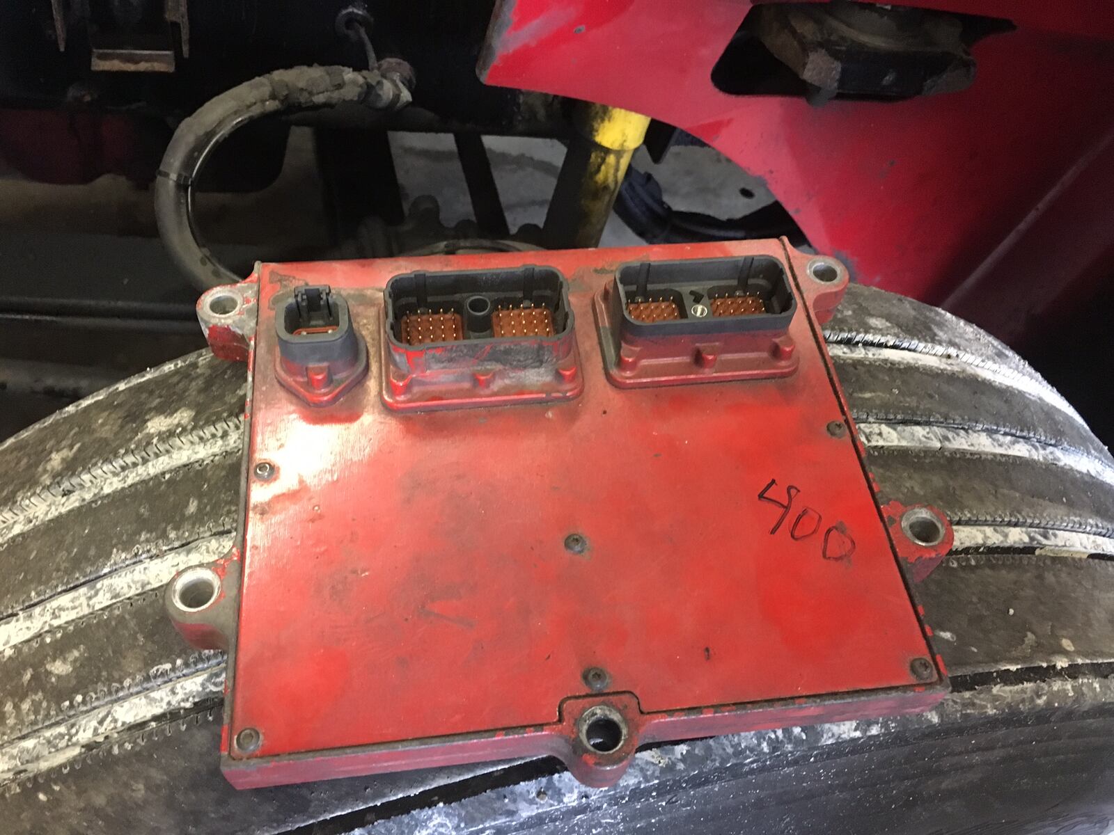 A semi-trailer's engine control module, or "black box," with a recorded history of the engine. JOHN BEDELL/STAFF