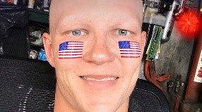 Senior Airman Brandon Yuhaniak visits his father’s mechanic shop in Uniontown, Pa. During his first year at Kadena Air Base, Japan, he was diagnosed with Hodgkin’s lymphoma and was sent home for treatment. He is now serving as an 88th Medical Squadron administrative technician at Wright-Patterson Air Force Base. (Contributed photo)