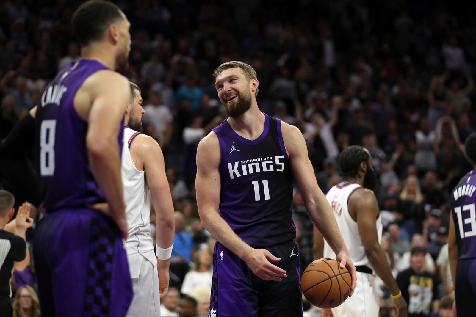 Sacramento Kings center Domantas Sabonis (11) reacts to a foul called on him during the second half of an NBA basketball game against the Los Angeles Clippers, Friday, April 11, 2025, in Sacramento, Calif. (AP Photo/Scott Marshall)