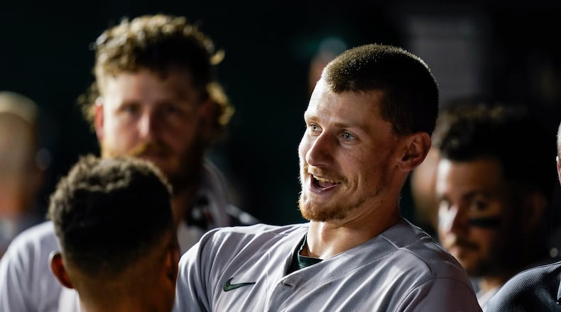 Oakland Athletics' Sean Murphy, center, smiles after his grand slam during the fifth inning of the team's baseball game against the Washington Nationals at Nationals Park, Tuesday, Aug. 30, 2022, in Washington. (AP Photo/Alex Brandon)