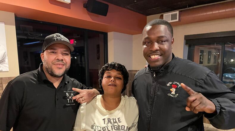 The Wing Warz Competition is from 2 to 7 p.m. at Bleachers Sport Bar and Grill, located at 4317 Linden Ave. in Riverside. Pictured (left to right) is Anthony Mitchell, Devanna Washington and Michael Baxter. NATALIE JONES/STAFF