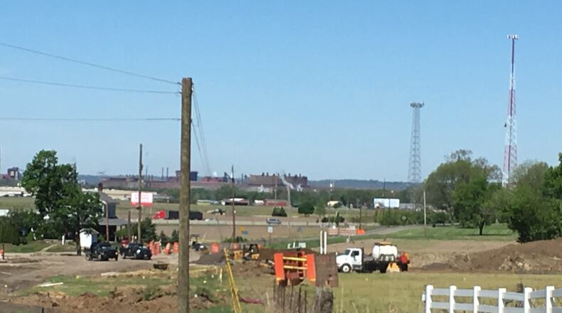 The Warren County Port Authority is refinancing debt for this roundabout project at Greentree and Union roads through its new bond fund. Construction is complete and the intersection has reopened. LAWRENCE BUDD/STAFF