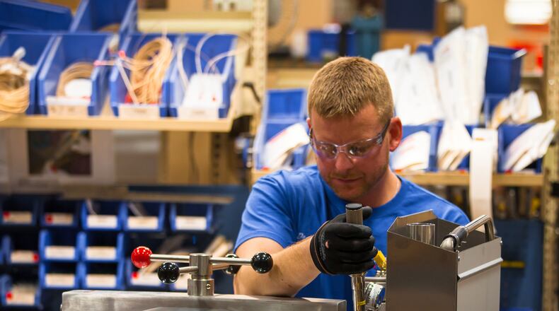Workers at Eaton’s Henny Penny make high-pressure fryers for the fast-food and restaurant industry. CONTRIBUTED PHOTO