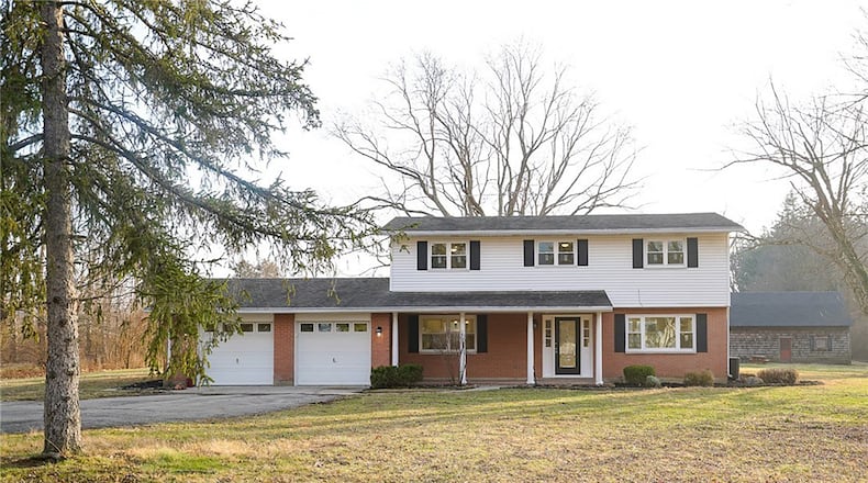 This traditional two story sits on nearly six acres in Washington Township. It has four bedrooms and two and one half bathrooms and has been completely updated and remodeled. CONTRIBUTED