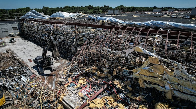 The Meijer Distribution Center in Tipp City was on its way to recovery in this June 27 picture, after a tornado ripped up the northwest corner of this building on June 8, 2022. Workers were removing pieces of the collapsed metal structure. JIM NOELKER/STAFF