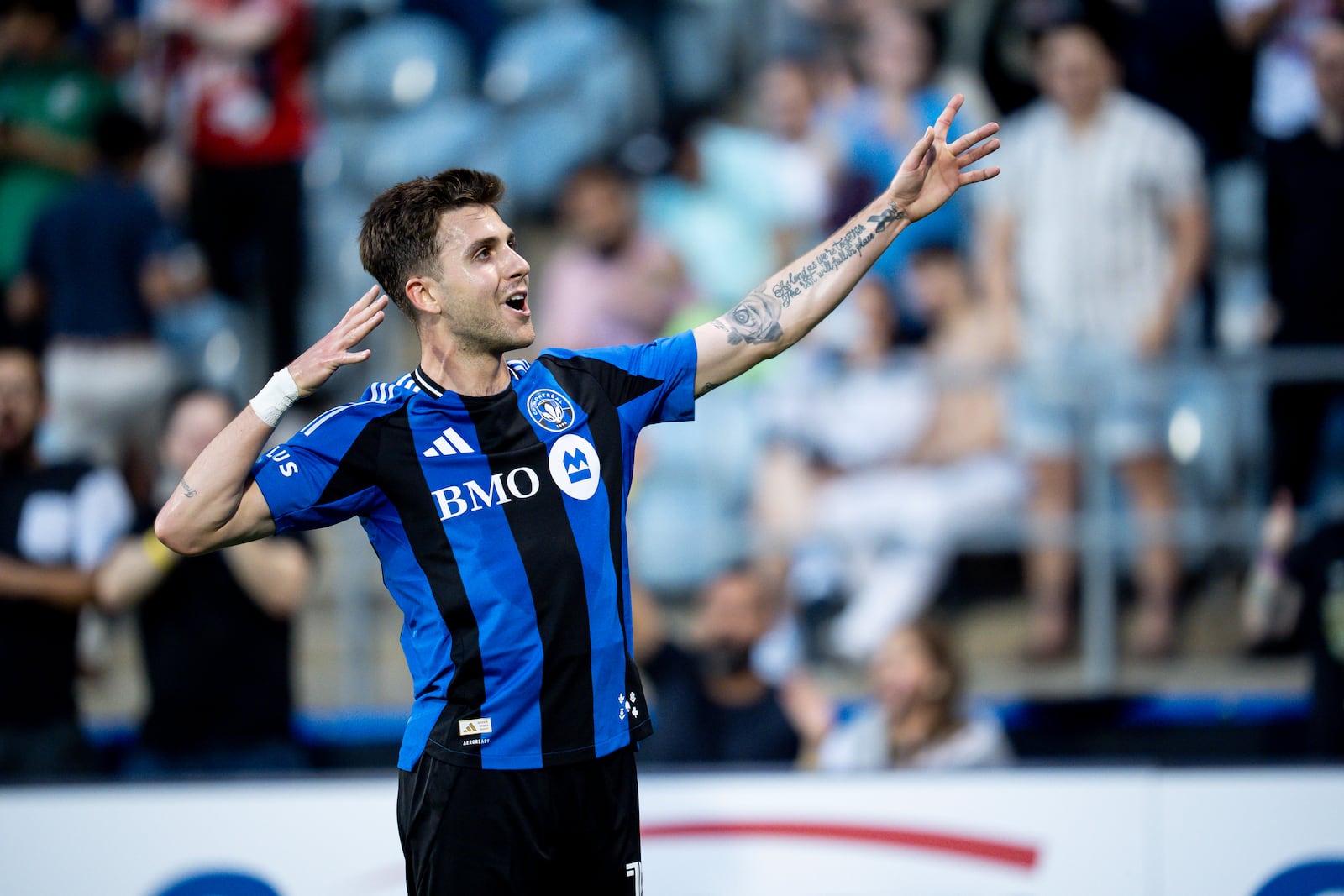 CF Montreal's Luca Petrasso (13) celebrates after scoring during first half MLS soccer action against the Columbus Crew in Montreal, Quebec, Wednesday, May 14, 2025. (Christopher Katsarov/The Canadian Press via AP)