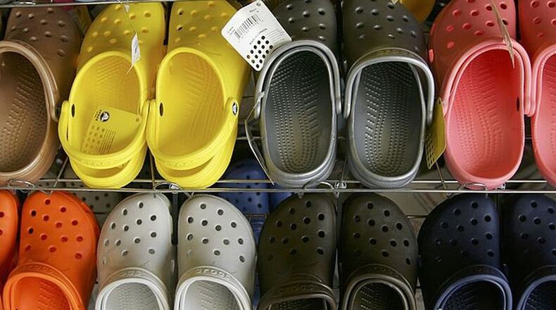FILE PHOTO: The company is giving away 10,000 pairs a day through an online registration. The waterproof, easily cleanable, rubber-like clog is popular with health care workers.