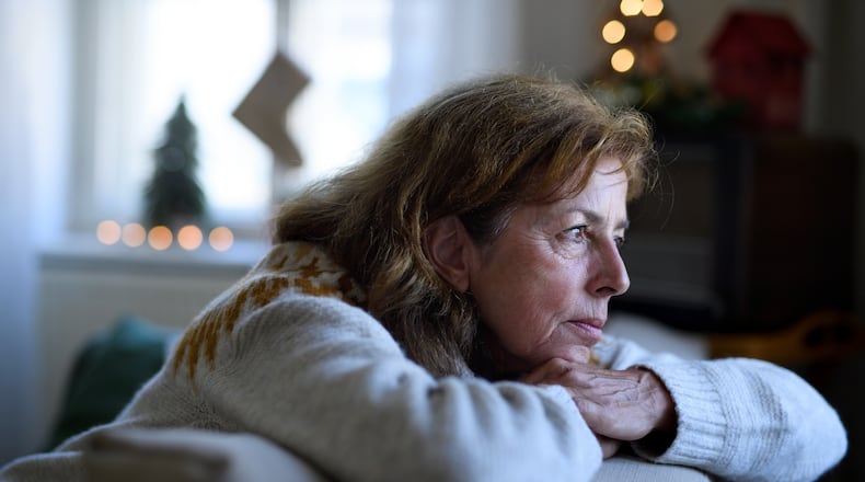 The holidays and winter months can be a lonely time for some, so experts encourage small gestures, such as visiting a neighbor who lives alone, to help boost spirits and combat loneliness. CONTRIBUTED