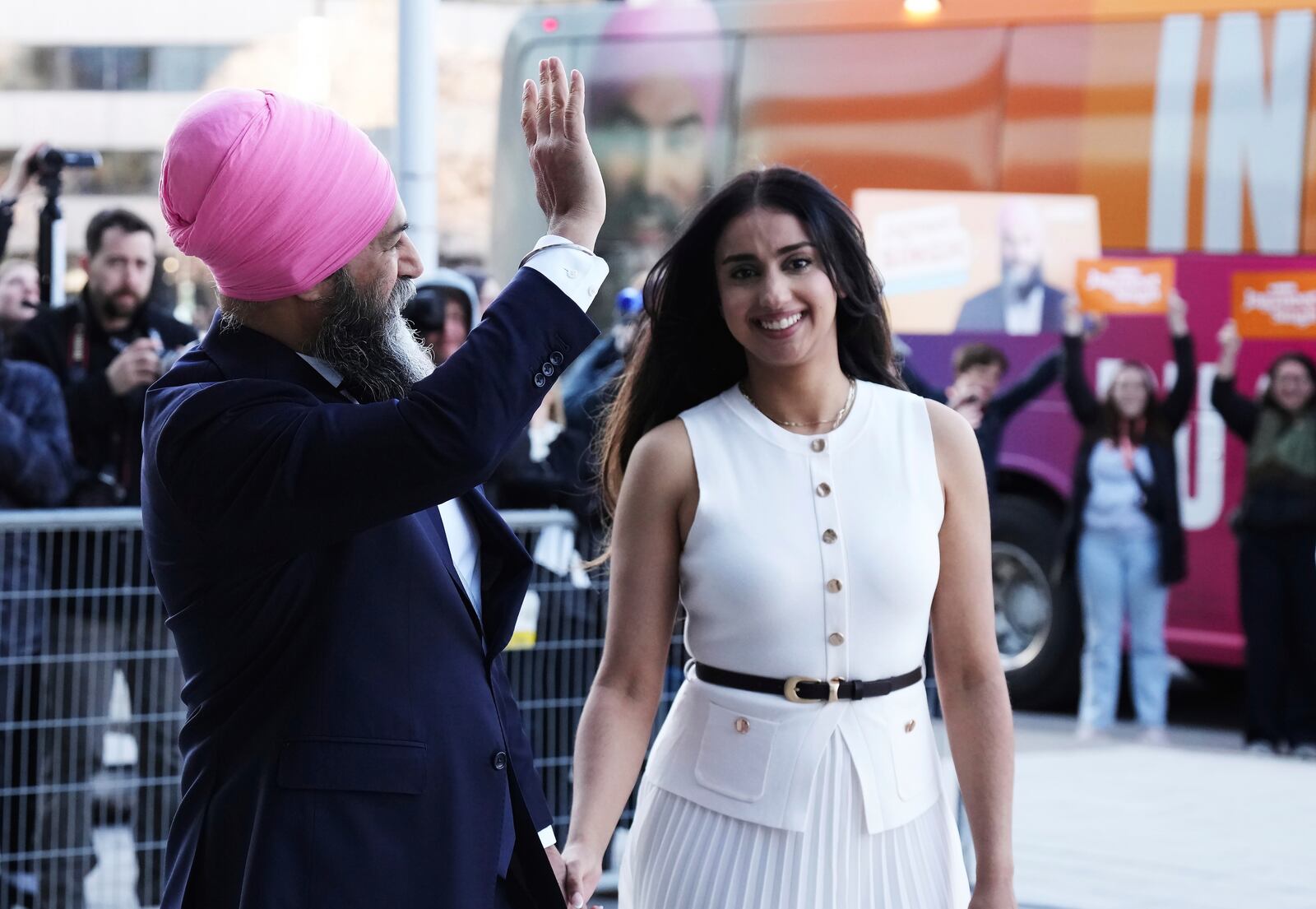 New Democratic Party (NDP) Leader Jagmeet Singh and his wife Gurkiran Kaur Sidhu arrive for the English-language federal election leaders' debate, in Montreal, Thursday, April 17, 2025. (Chris Young/The Canadian Press via AP)