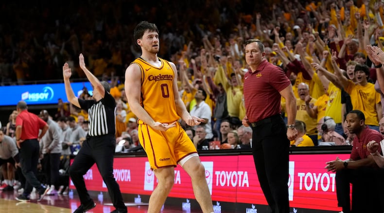 Iowa State guard Nate Heise (0) celebrates after making a 3-point basket during the second half of an NCAA college basketball game against Houston, Monday, Feb. 16, 2026, in Ames, Iowa. (AP Photo/Charlie Neibergall)