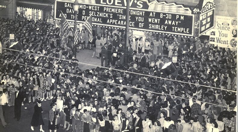 A crowd fills the sidewalk outside the old Loew's Theater on Main Street in Dayton. The marquee lists a showing of "Since You Went Away," which was released in 1944, and a personal appearance by Shirley Temple, who had a role in the movie.