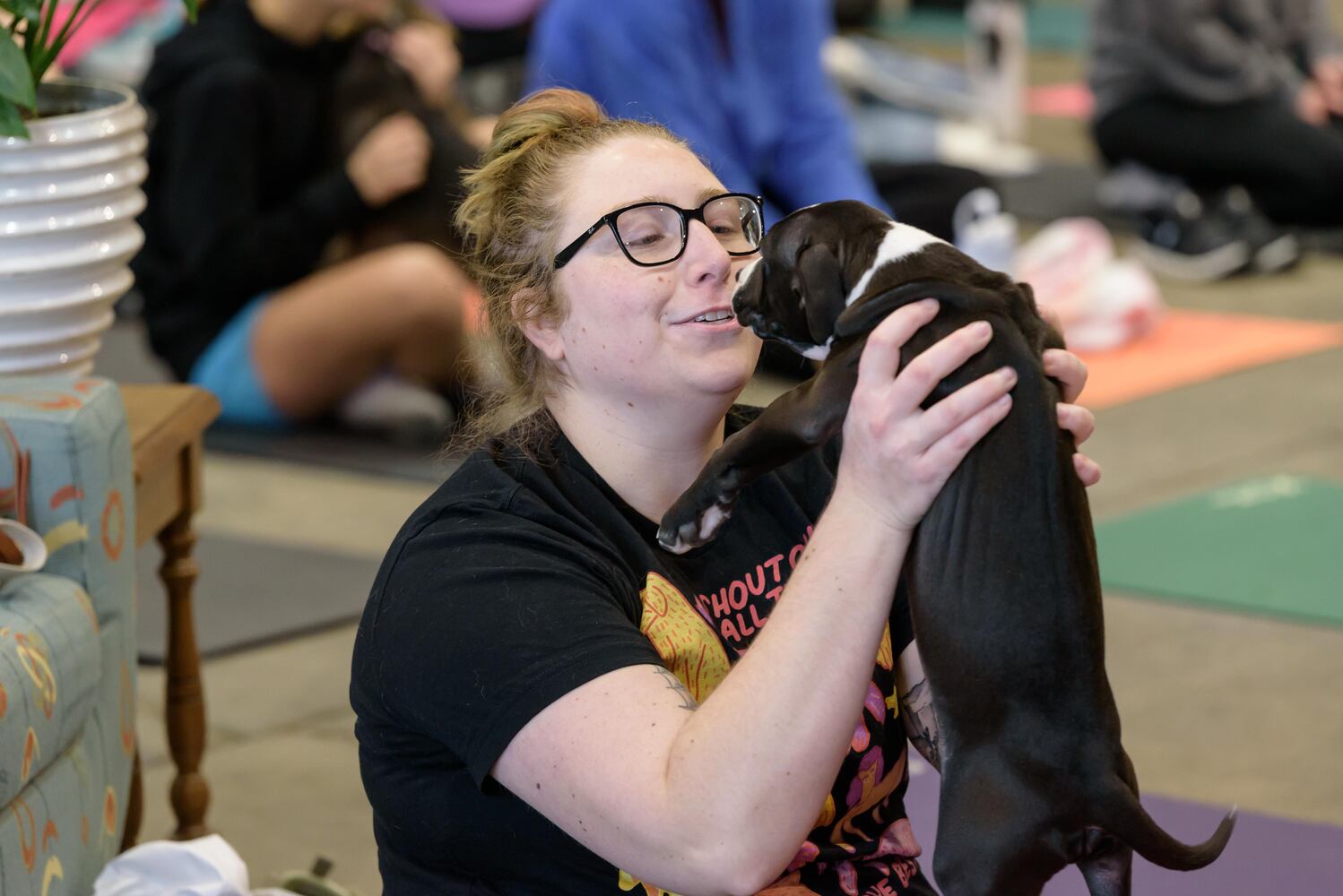 PHOTOS: Puppy Yoga with Adopt a Pit at Base Camp Outdoors Co. in downtown Dayton