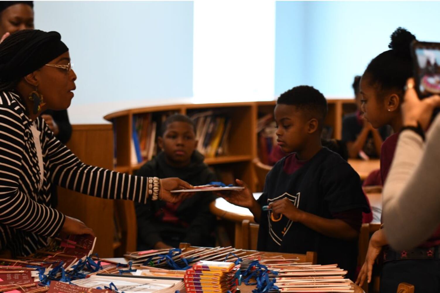 Photos: Dayton Strong! Kids receive copies of book they wrote about tornadoes