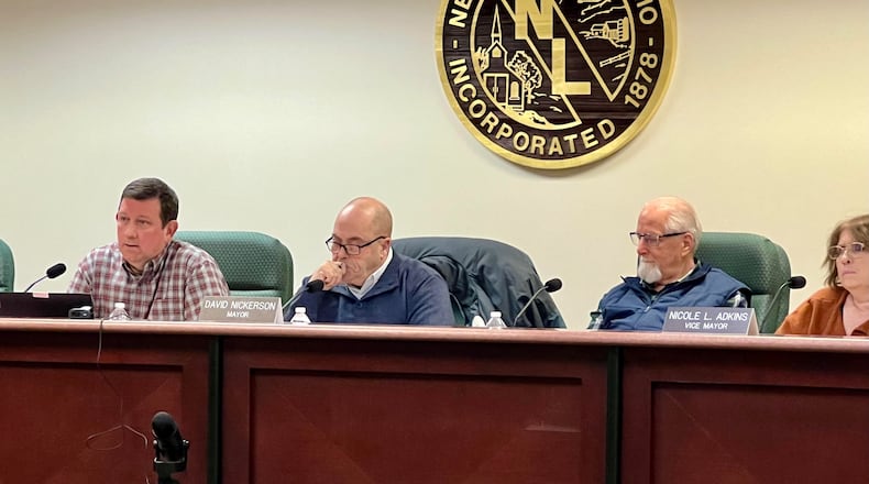 Wednesday, Feb. 19, 2024, is the final day for interim manager Rob Anderson, left, as the village of New Lebanon has selected a permanent replacement this week. Also in the photograph are Mayor David Nickerson, center, law director Mike McNamee, and Councilwoman Nicole Adkins, far right. AIMEE HANCOCK/STAFF