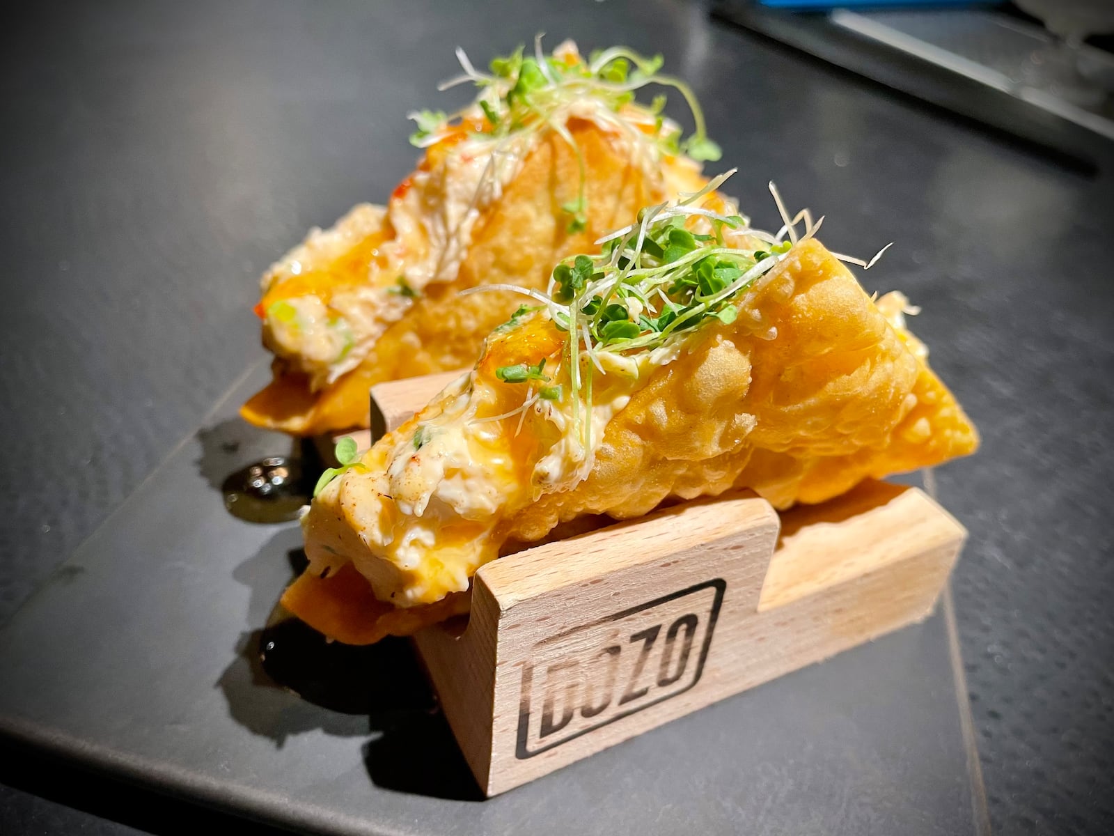 Dozo, an elevated sushi experience in the back room of Tender Mercy in downtown Dayton, has reopened with a new chef and menu. NATALIE JONES/STAFF