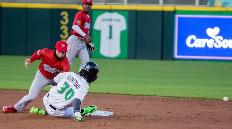 Dragons' outfielder Yerlin Confidan steals second base in the third inning of Tuesday night's home opener at Day Air Ballpark. Jeff Gilbert/CONTRIBUTED