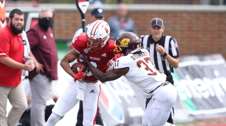 Miami wide receiver Mac Hippenhammer tries to break free from a Central Michigan's Rolliann Sturkey during a game at Yager Stadium on Oct. 2, 2021. Miami University Athletics photo