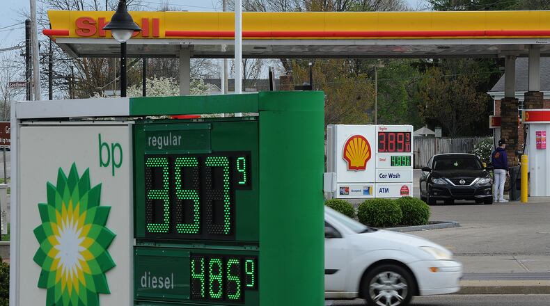 Gas prices at the BP and Shell stations on opposite sides of the street at the corner of Far Hills Avenue and Stroop Road in Kettering have drastically different gas prices. Wide gaps in prices at neighboring gas stations are likely a case of one station that has already raised prices while the other one holds on as long as it can before doing so itself, according to Patrick De Haan, head of petroleum analysis at GasBuddy, which tracks fuel prices. MARSHALL GORBY/STAFF