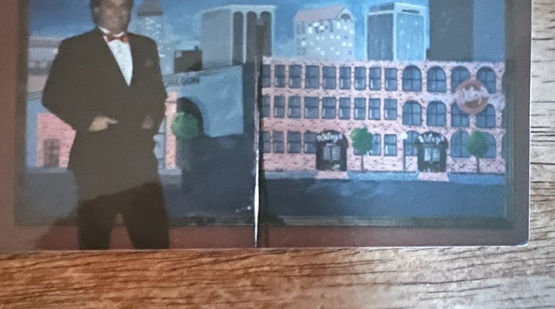 Dan "Wiley" Lafferty with the Dayton Oregon District mural. CONTRIBUTED