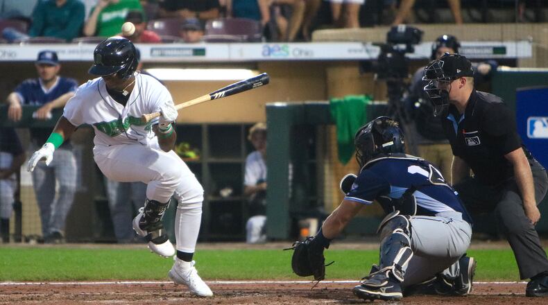 Victor Acosta is hit by a pitch as part of Dayton's three-run fifth inning in Wednesday's 5-3 win over West Michigan at Day Air Ballpark. Cassie Pietruszka/CONTRIBUTED