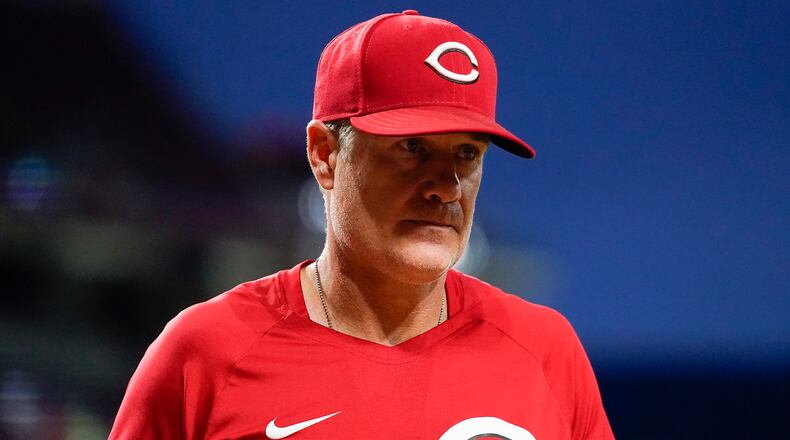 Cincinnati Reds manager David Bell walks to the dugout during the seventh inning of the second baseball game of a doubleheader against the Pittsburgh Pirates, Thursday, July 7, 2022, in Cincinnati. (AP Photo/Jeff Dean)