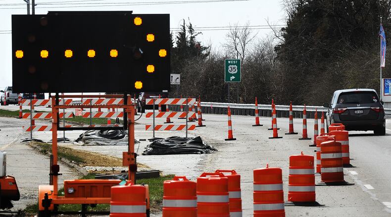 The Ohio Department of Transportation’s work on the Woodman Drive overpass over U.S. 35 began in spring 2023, making the interchange into a tight urban diamond and bringing ramps closer toward the highway, ODOT officials said. MARSHALL GORBY\STAFF