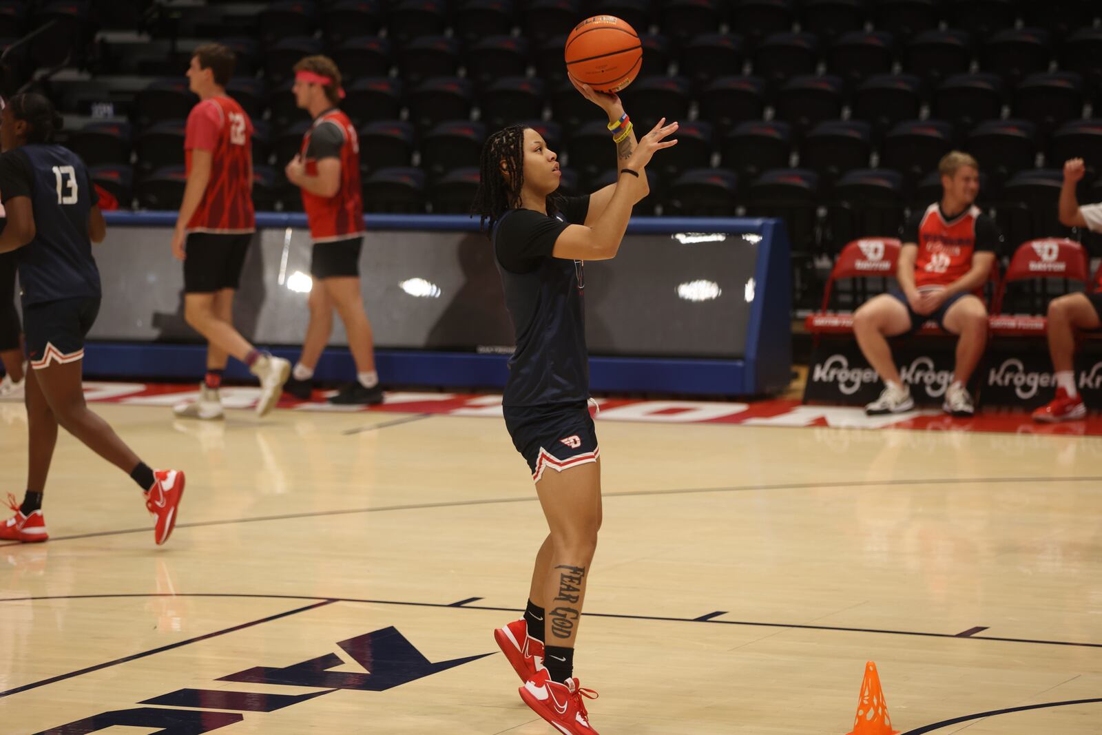Dayton's Nayo Lear shoots during practice on Tuesday, Oct. 4, 2022, at UD Arena. David Jablonski/Staff
