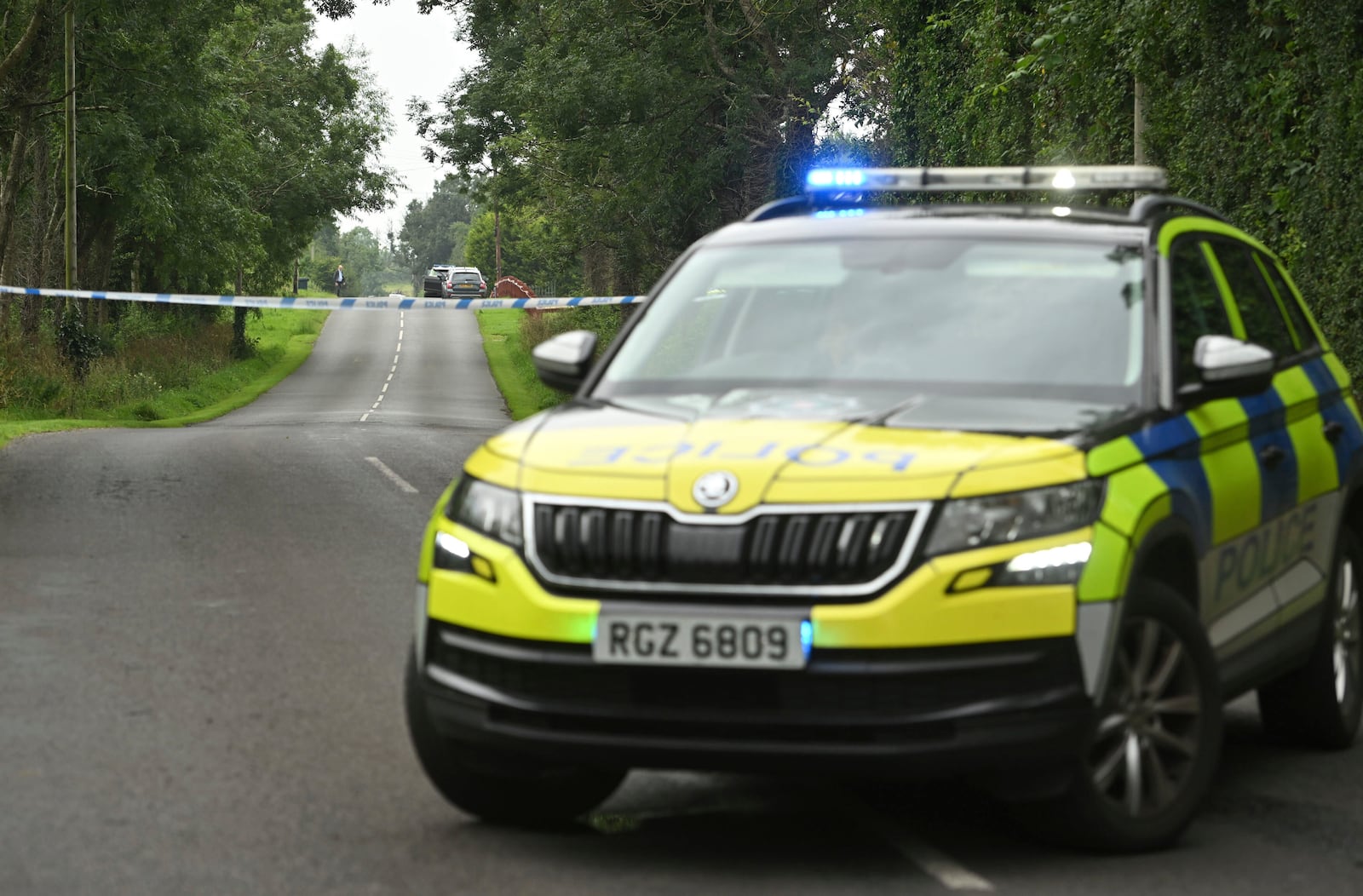 The scene in the Drummeer Road area of Maguiresbridge, Northern Ireland, Wednesday, July 23, 2025, after a shooting incident. (Oliver McVeigh/PA via AP)
