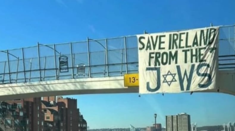 Cincinnati Police said they received several calls related to a banner that hung above an overpass this past weekend that said "Save Ireland from the Jews." CREDIT: Provided by Cincy Jewfolk
