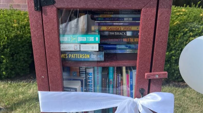 A Little Free Library was started at the Coffman YMCA in Springboro to celebrate the life of Justin McCurdy. CONTRIBUTED PHOTO