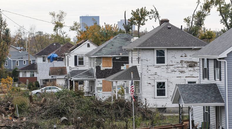Many houses along Rolfe Avenue in Harrison Twp. continued to bear the scars of an EF4 tornado months after the Memorial Day storm. CHRIS STEWART / STAFF