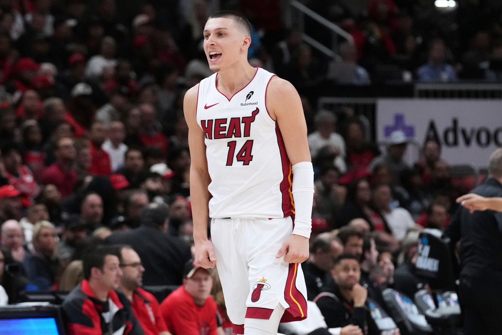 Miami Heat guard Tyler Herro reacts after scoring a basket during the second half of an NBA play-in tournament basketball game against the Miami Heat in Chicago, Wednesday, April 16, 2025. (AP Photo/Nam Y. Huh)