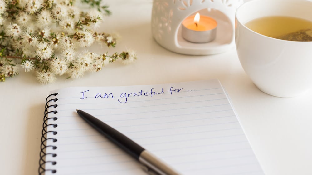 A 2015 study in the Journal of Positive Psychology found that writing in a gratitude journal for just 15 minutes a day significantly lowered depressive symptoms and stress levels after only three weeks. ISTOCK