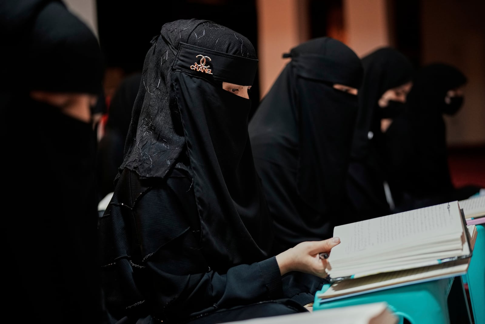 Afghan girls attend a religious studies class at an religious education center in Kabul, Afghanistan, Wednesday, May 28, 2025. (AP Photo/Ebrahim Noroozi)