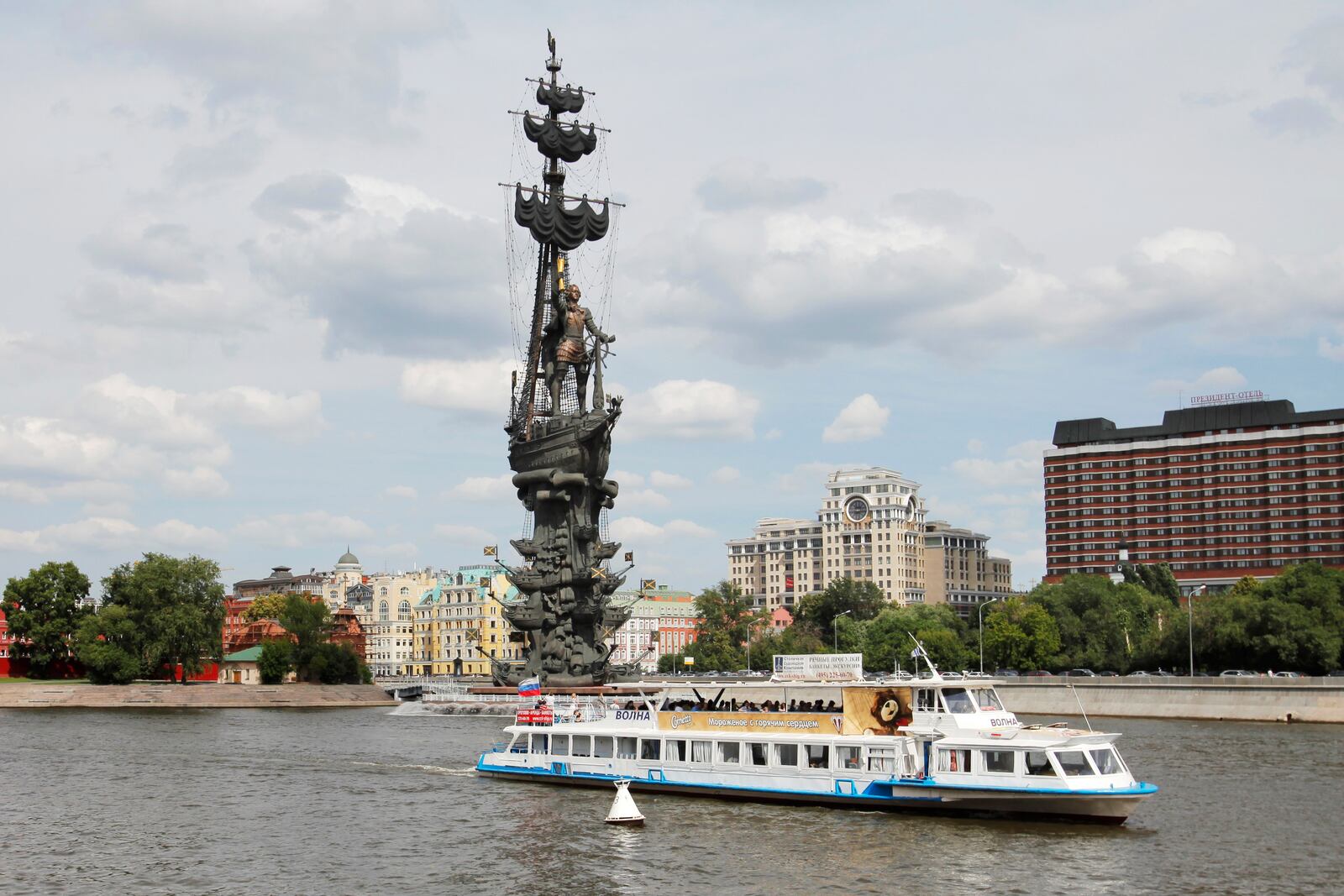 FILE - A boat floats past a huge monument to Peter the Great, created by Georgian and Russian sculptor Zurab Tsereteli, on the Moscow River in Moscow, on June 26, 2012.(AP Photo/Alexander Zemlianichenko, File)