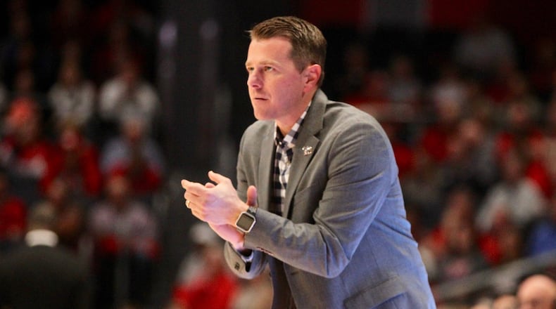 Cedarville’s Pat Estepp coaches during an exhibition game against Dayton on Saturday, Nov. 2, 2019, at UD Arena. David Jablonski/Staff
