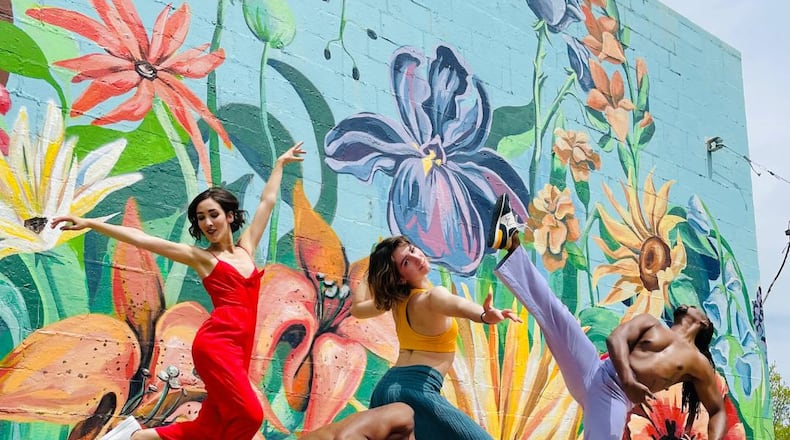 L-R: Dayton Dance Initiative company members Miranda Dafoe, Devin Baker, Emilia Dagradi and Quentin Sledge. CONTRIBUTED/MURAL BY TIFFANY CLARK
